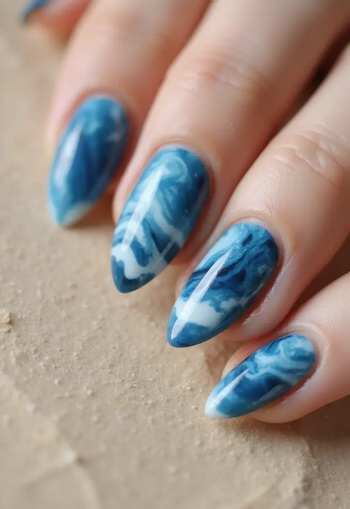 22 Serene Blue Nail Ideas for Calm - 6. Ocean Breeze Marble