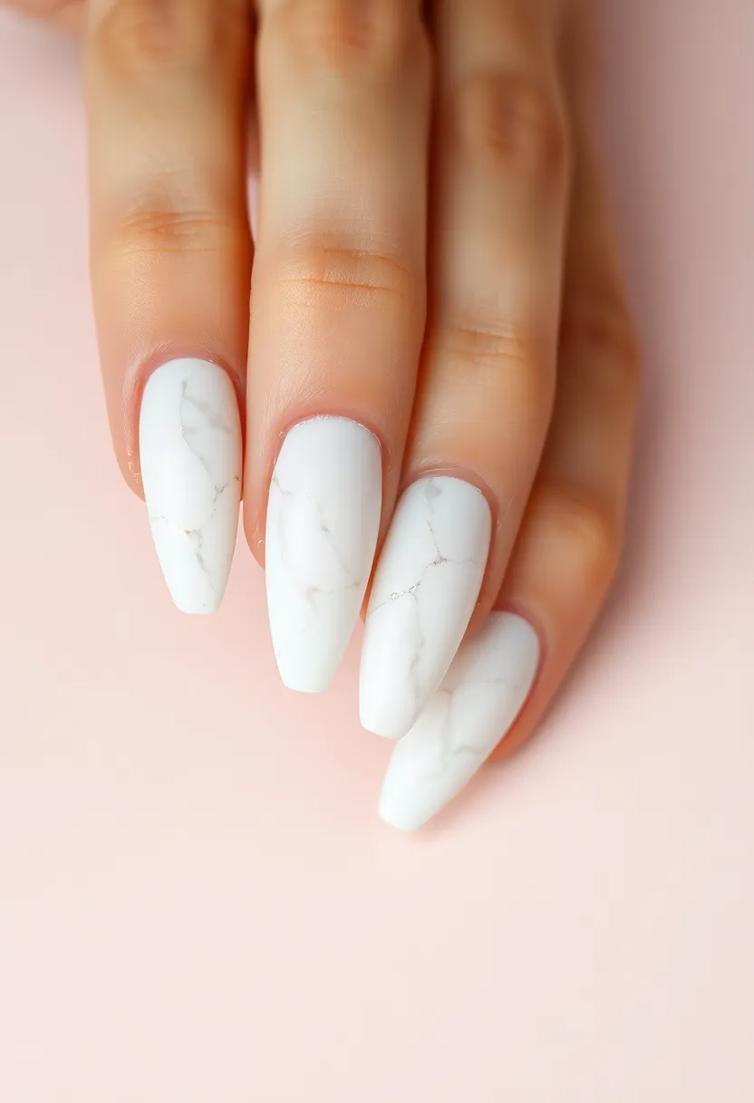 28 Clean White Nail Ideas for Minimalist - 12. White Marble Effect