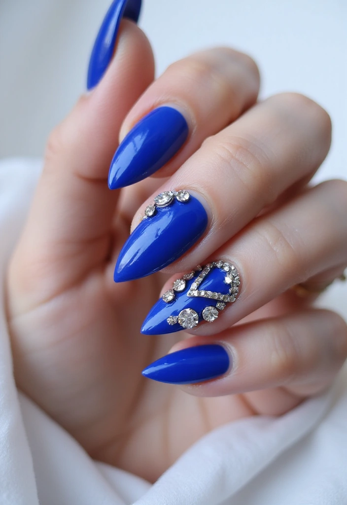 40 Rhinestone Nail Ideas for Dazzling Detail-Oriented Drama - 3. Bold Stiletto Nails with Rhinestone Accents