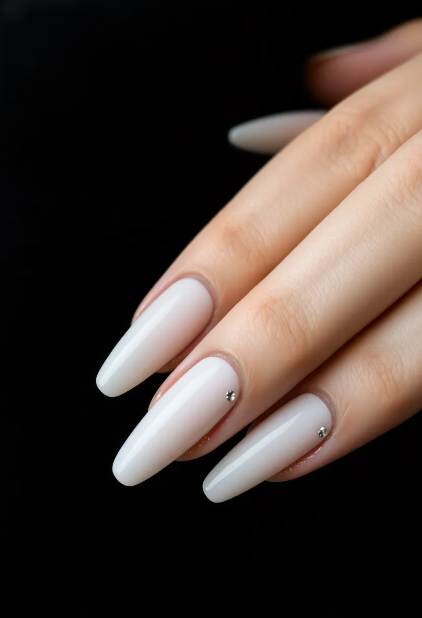 45 Crisp White Nail Ideas for Pure Ethereal Elegance - 26. White Rhinestone Tips