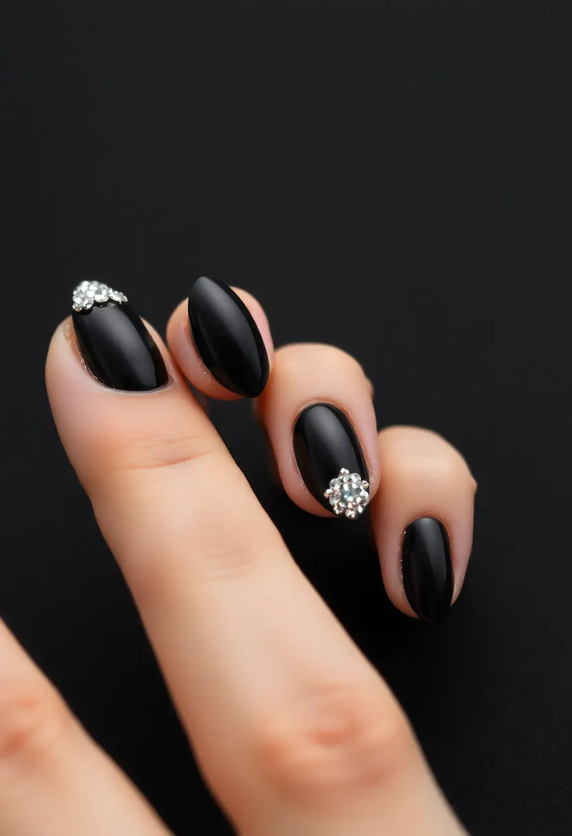 45 Sleek Black Nail Ideas for Timeless Beauty - 36. Black with Crystal Tips