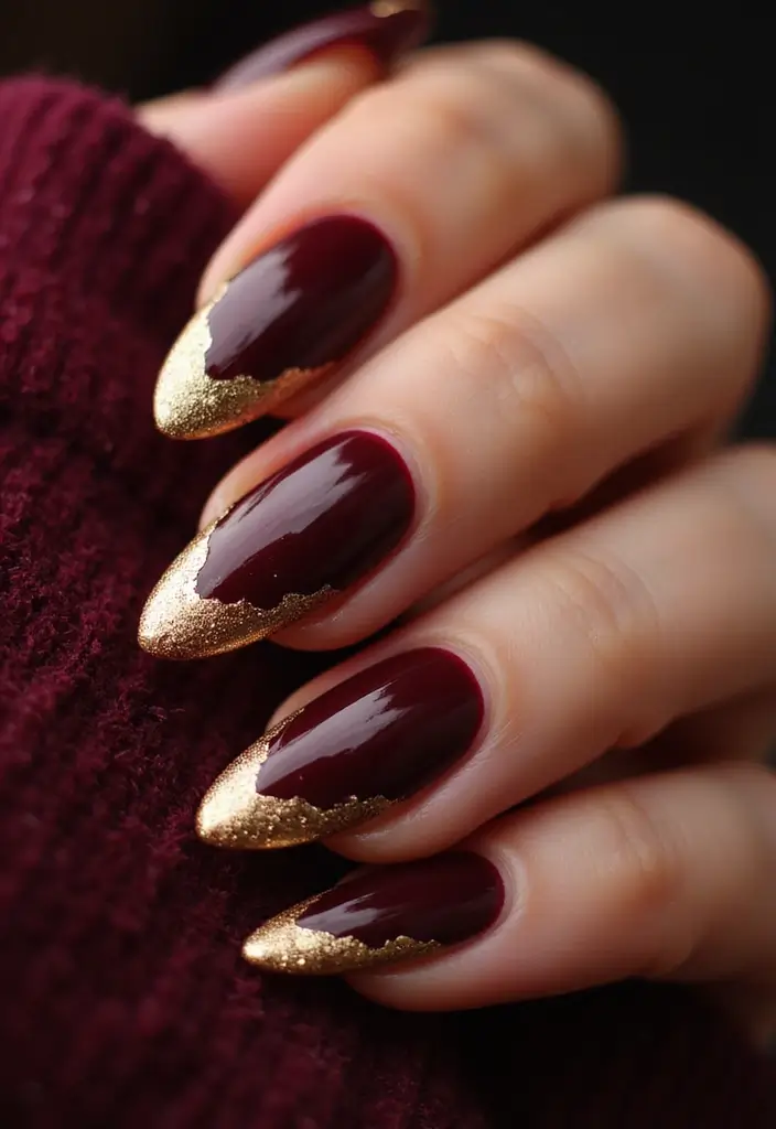 50 Holiday Nail Ideas for Seasonal Sparkling Celebrations - 9. Elegant Gold Foil on Burgundy