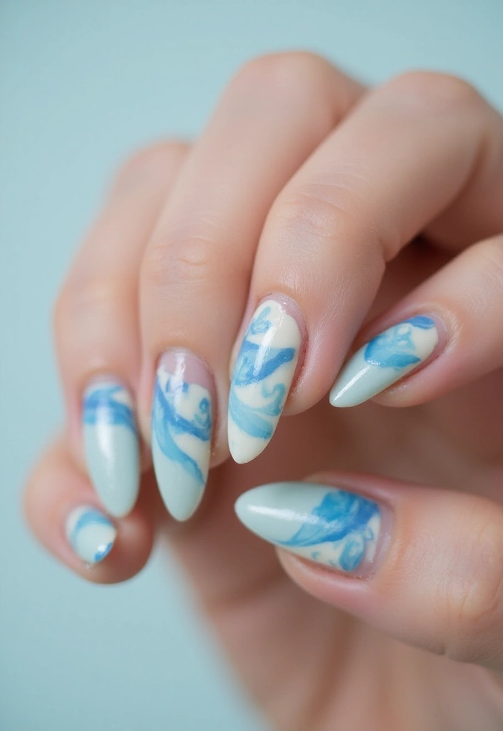 50 Versatile Blue Nail Ideas for Every Mood and Epic Moment - 30. Blue and Cream Swirl