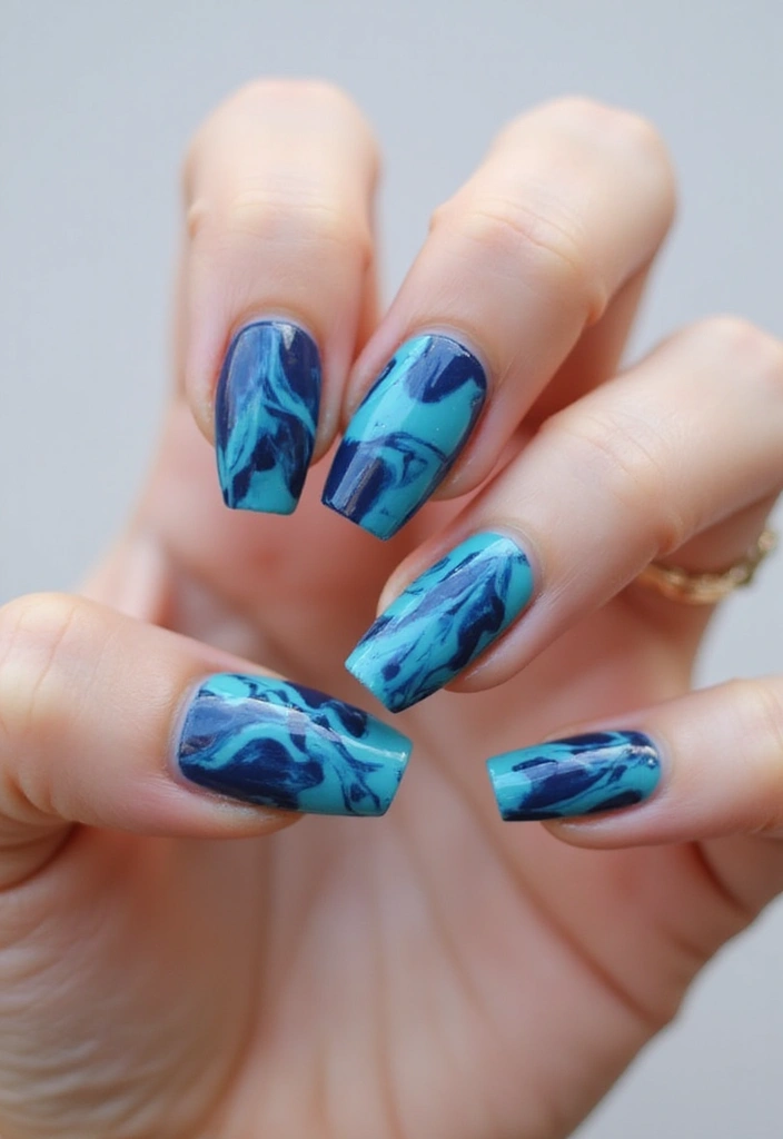 50 Versatile Blue Nail Ideas for Every Mood and Epic Moment - 4. Blue Marble Effect