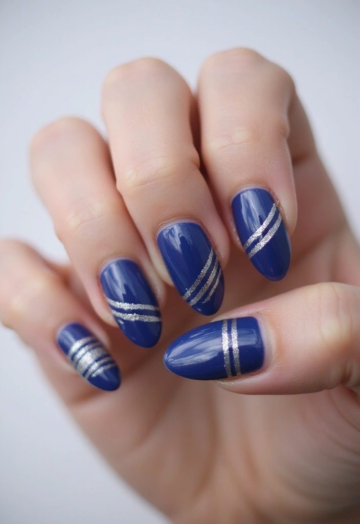 50 Versatile Blue Nail Ideas for Every Mood and Epic Moment - 44. Blue and Silver Striped Nails